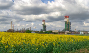 View of an industrial area, showcasing the importance of effective weed control in commercial settings.